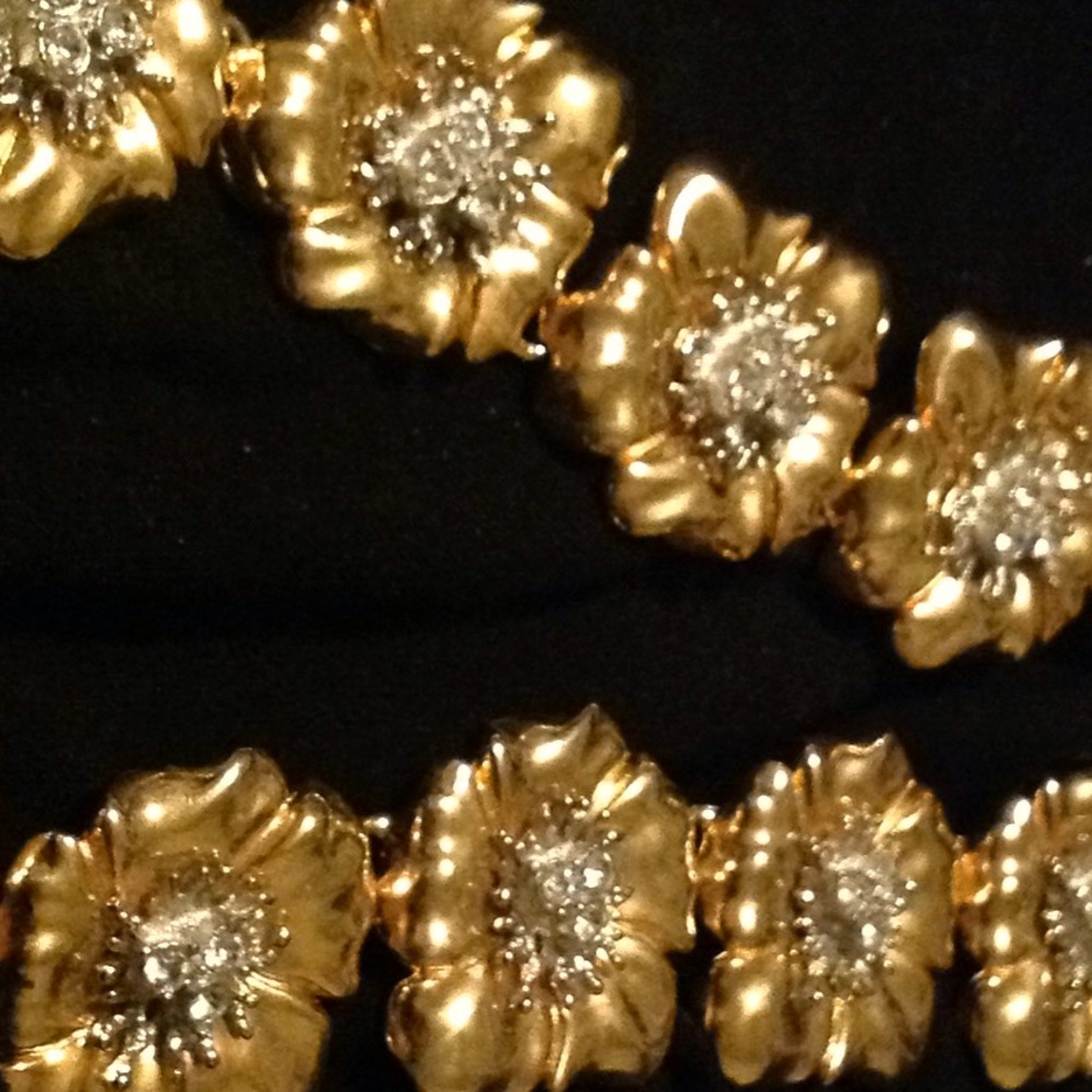 Gold tone flower statement necklace